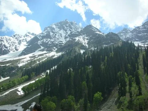 The snow mountain range in summer Stock Photos