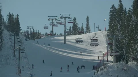 SNOW MOUNTAIN WITH SKIERS Stock Footage 223372682