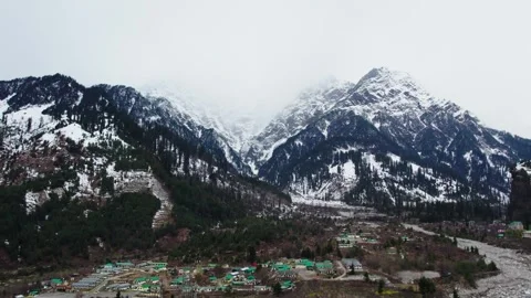 Snow Mountain Valley with Pine Forest and Remote Village Landscape Video stock 332168088