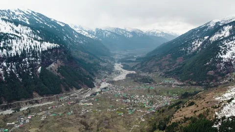 Snow Mountain Valley with Pine Forest and Remote Village Landscape Video stock 332174708
