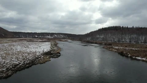 Snow Mountains And Winding Winter River in Arxan, China Stock Footage 344036019