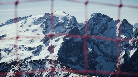 Snow mountains between mesh Stockbeeldmateriaal 75787248