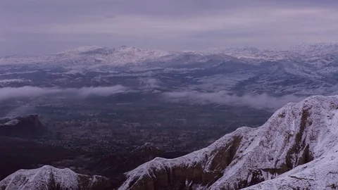 Snow Mountains in clouds 4 Stock Footage 83800338
