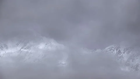 Snow mountains with clouds and mist is beautiful landscape by time-lapse Stock-Footage 149921149