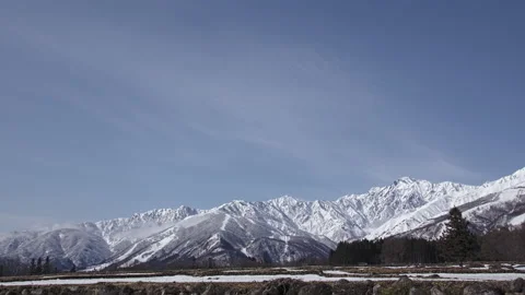 Snow mountains with clouds and mist is beautiful landscape by time-lapse Stock Footage 149972749