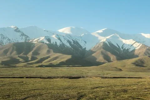 Snow mountains with clouds Stock Photos