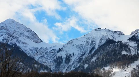 Snow Mountains Clouds TimeLapse Stock Footage