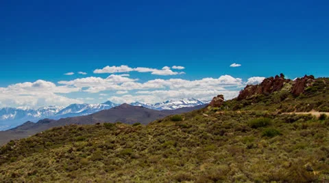 Snow Mountains Landscape Background by a Sandy Roa Video stock 24972116