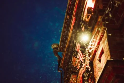Snow at night by the lantern Stock Photos