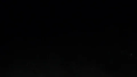 Snow at night in a strip of light Stock Footage 105742029
