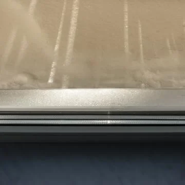 Snow outside the window Stock Photos