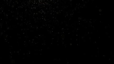 The snow particles will gradually move smoothly blowing on a black background Stock Footage 249258069