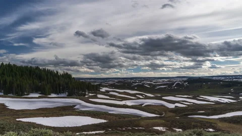 Snow patterns left on hillside in spring Yellowstone landscape Stock Footage 167074285