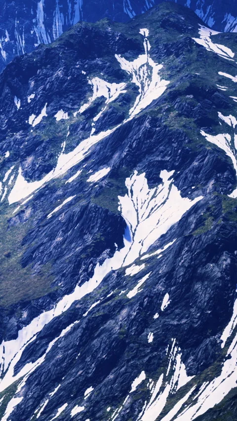 Snow patterns on mountain slopes in a remote area during daytime hours Stock Footage 336187767