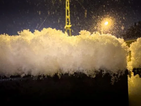 Snow piled up on the iron Stock Photos