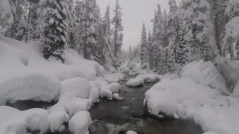 Snow Pillows on a winte river Stock Footage 98267670