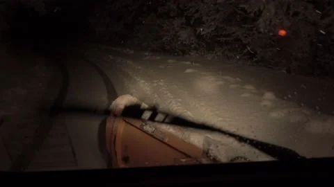 Snow plow in action during a snowfall Stock Footage 153317320