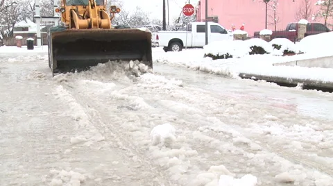 Snow plow clearing snow Stock Footage 57673173