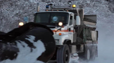 Snow Plow Passing Partial Pan Follow 4K Stock Footage 60816581