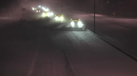 Snow Plow Trucks Plowing Interstate - V2 Stock Footage 42764610
