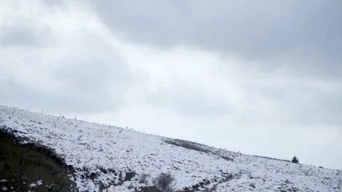 Snow puddle on a mountain slope Stock Footage 166698296