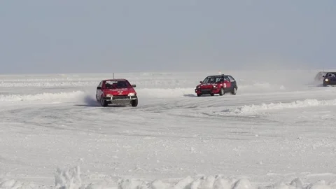 Snow Racing. Car Drifts on the middle of a frozen lake. Stock Footage