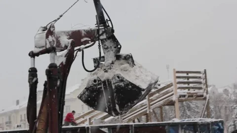 Snow-removal bucket in operation Stock Footage 83646582