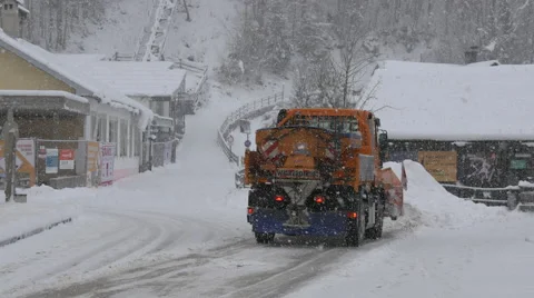 Snow removal machine driving in Hallstatt Video stock 61473343