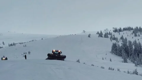Snow removal machine in snowy mountains Stock Footage 295659206