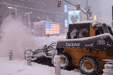 Snow removal machine in Times Square during heavy snowfall Stock Photos