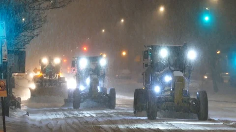 Snow removal operation during the night Stock Footage 125553828