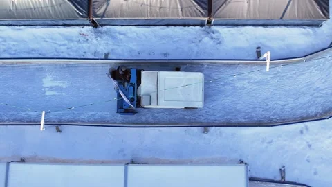 Snow removal process using machinery on a large surface area Stock Footage 327140785