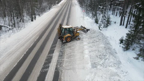 Snow removal from roads in winter Stock Footage 168937488