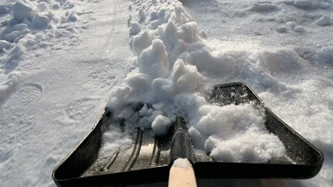 Snow removal with a shovel. Stock Footage 122586986