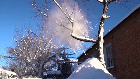 Snow removal in a snowy Stock Footage 327387732