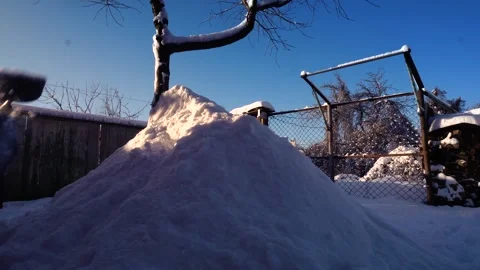 Snow removal in a snowy Stock Footage 327387802