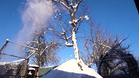 Snow removal in a snowy Stock Footage 327387871