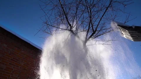 Snow removal in a snowy Stock Footage 327387878