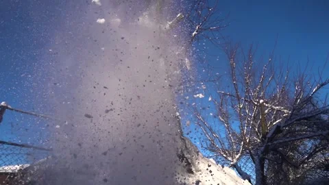Snow removal in a snowy Stock Footage 327388383