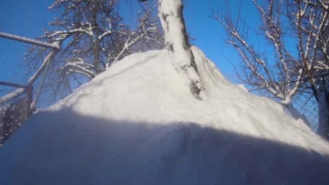 Snow removal in a snowy Video stock 327388451