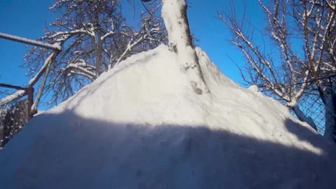 Snow removal in a snowy Stock Footage 327388456