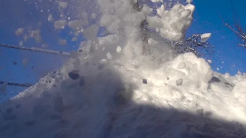 Snow removal in a snowy Stock Footage 327388479