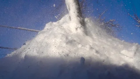 Snow removal in a snowy Video stock 327388498