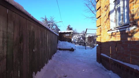 Snow removal in a snowy Stock Footage 327388734