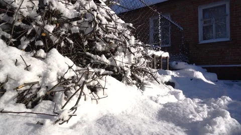 Snow removal in a snowy Stock Footage 327388780
