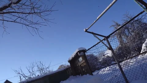 Snow removal in a snowy Stock Footage 327389033