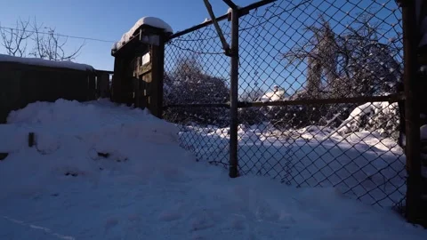 Snow removal in a snowy Video stock 327389189