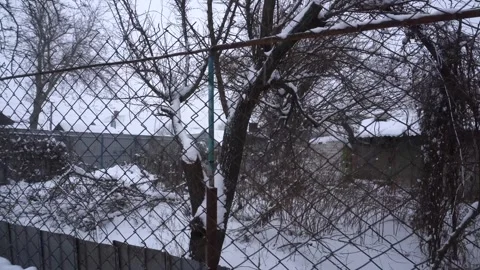 Snow removal in a snowy Stock Footage 327389816