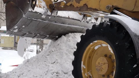 Snow removal with a tractor. Stock Footage 148433270