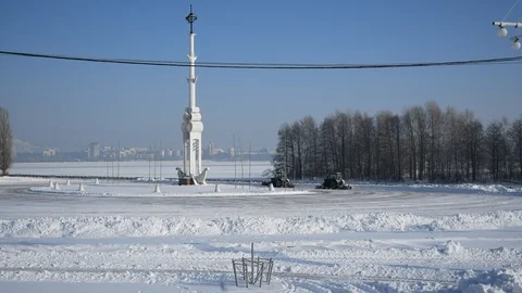 Snow removal tractor in winter park Stock Footage 100849002